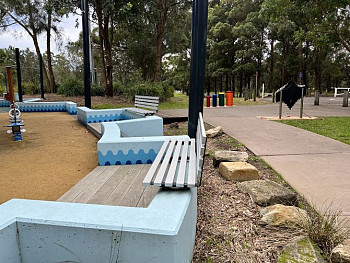 EM115-A Stella Seat modified plinth seat - Garrison Point Playground.JPG